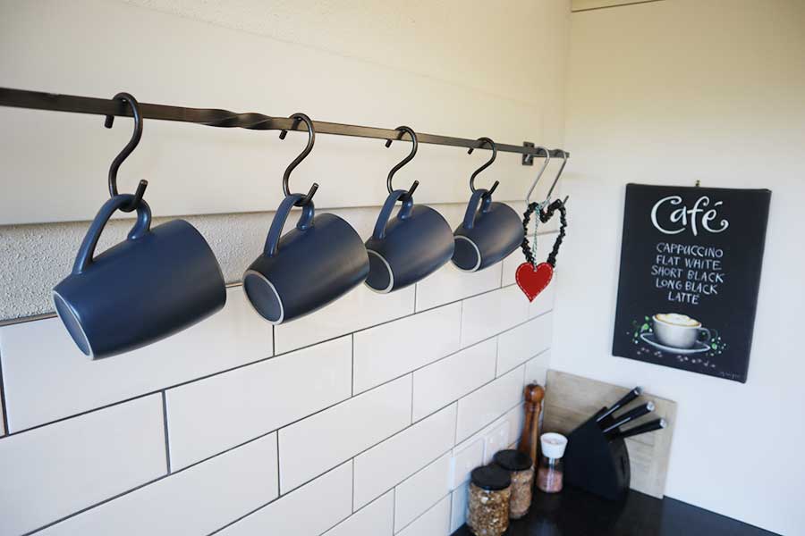 cromwell accommodation cherry tree farm cups on a rack