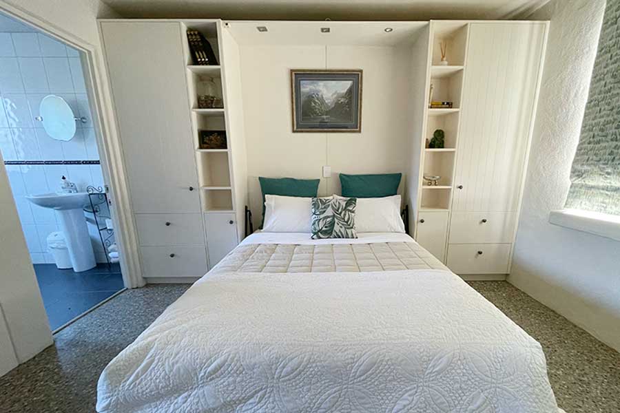 cromwell accommodation cherry tree farm bedroom with shelves and cupbaords